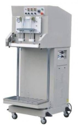 Упаковщик бескамерный Hualian Machinery DZQ-600L
